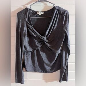 Woman’s dark gray top